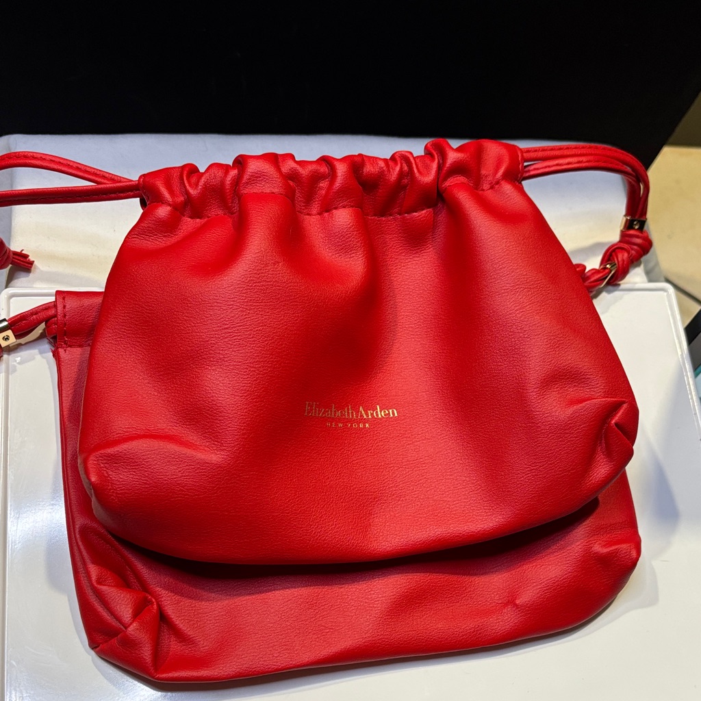 Two Elizabeth Arden Red Drawstring Bags